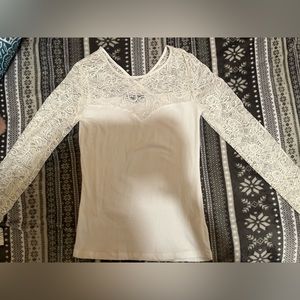 White long sleeve shirt with lace long sleeve. Size small.